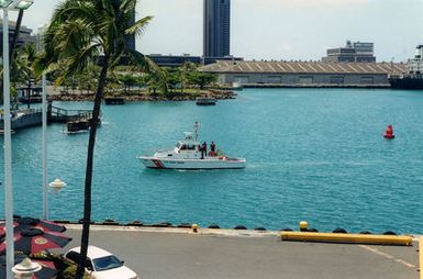 A high-angle port side view of the US Coast Guard (USCG) Utility Boat (UTB 41317) underway off pier #7 in the harbor at Honolulu, Hawaii (HI), during a demonstration as part of Safe Boating Week