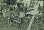 NMO [Native Medical Orderly] treats Iuri mountain people, Sepik district, [Papua New Guinea], Nov to Dec 1954