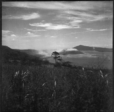 Smoke rising from Vulcan Island after the eruption, Rabaul Harbour, New Guinea, 1937 / Sarah Chinnery