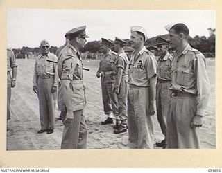 TOROKINA, BOUGAINVILLE, 1945-07-05. HIS ROYAL HIGHNESS, THE DUKE OF GLOUCESTER, GOVERNOR-GENERAL OF AUSTRALIA (1), SPEAKING WITH GROUP CAPTAIN J BUSCH, SENIOR STAFF OFFICER, ROYAL NEW ZEALAND AIR ..