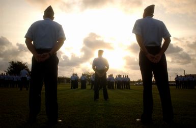 U.S. Air Force Airmen with the 36th Communication Squadron, 36th Air Expeditionary Wing, stand at parade rest during an open ranks inspection at Andersen Air Force Base, Guam, on Jan. 19, 2005. (U.S. Air Force PHOTO by TECH. SGT. Cecilio M. Ricardo Jr.)(Released)