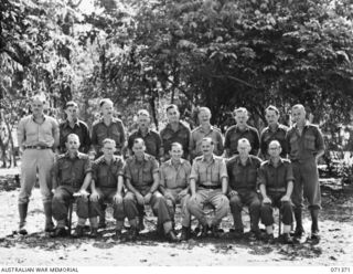 KILIGIA, NEW GUINEA, 1944-03-16. OFFICERS SHORTLY BEFORE ATTENDING A CONFERENCE AT HEADQUARTERS 5TH DIVISION. IDENTIFIED PERSONNEL ARE: QX35727 LIEUTENANT C. HORN (3); SX3796 MAJOR J.K. LYNCH (4); ..