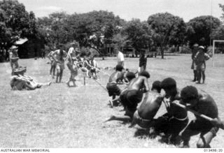 1942-09-09. A TUG-OF-WAR BETWEEN THE AUSTRALIANS AND THE PAPUANS DURING THE SPORTS MEETING HELD AT DOGURA. THIS WAS THE ONLY EVENT THAT THE "AUSSIES" WON. (NEGATIVE BY BOTTOMLEY)