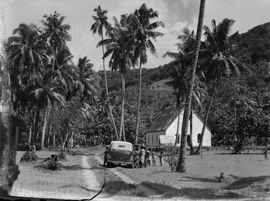 [Group of children next to car in Pacific Island location]