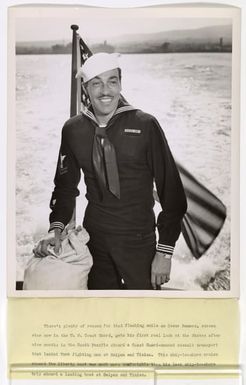 Cesar Romero, screen star now in the U. S. Coast Guard, gets his first real look at the States after nine months in the South Pacific