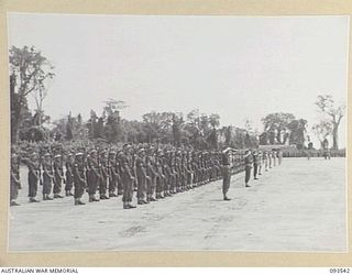 TOROKINA, BOUGAINVILLE. 1945-07-03. GENERAL VIEW OF THE ALLIED GUARD OF HONOUR DURING THE ROYAL SALUTE AFTER THE ARRIVAL OF HIS ROYAL HIGHNESS, THE DUKE OF GLOUCESTER, GOVERNOR-GENERAL OF ..