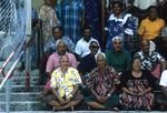 Taupulega (elders' council) and their wives