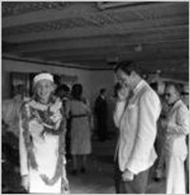 Tourists on board a navy ship or a tour boat off Pearl Harbor, Hawaii, 1930s