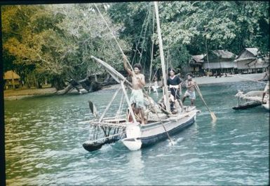 Native Affairs Patrol leaving Mapamoiwa village : Mapamoiwa village, D'Entrecasteaux Islands, Papua New Guinea, 1956 / Terence and Margaret Spencer