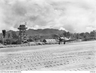 TOROKINA, BOUGAINVILLE ISLAND. 1945-01-15. 400750 FLIGHT LIEUTENANT I.C. CURTIS, NO. 5 SQUADRON, ROYAL AUSTRALIAN AIR FORCE TAKING OFF IN HIS COMMONWEALTH AIRCRAFT CORPORATION, "BOOMERANG" AIRCRAFT ..