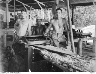 LAE, NEW GUINEA. 1945-12. PERSONNEL OF THE SAW MILL AT 4TH ADVANCED ORDNANCE DEPOT. (DONOR: J. W. K. BEDDOME)