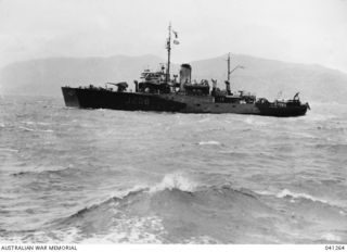 Milne Bay, Papua. c. 1943. Australian corvette HMAS Lithgow