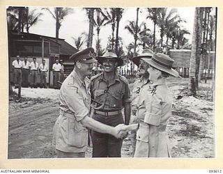 JACQUINOT BAY, NEW BRITAIN, 1945-07-02. HIS ROYAL HIGHNESS, THE DUKE OF GLOUCESTER, GOVERNOR-GENERAL OF AUSTRALIA (1), BEING INTRODUCED TO MATRON M.O. WHEELER (4), DURING HIS VISIT TO 2/8 GENERAL ..