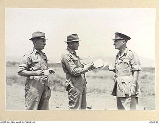 NADZAB, NEW GUINEA. 1945-04-14. SENATOR FRASER, ACTING MINISTER FOR THE ARMY (1), WITH MR SINCLAIR, SECRETARY, DEPARTMENT OF THE ARMY (2), AND LIEUTENANT GENERAL V.A.H. STURDEE, GENERAL OFFICER ..