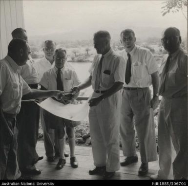 Staff looking at a map
