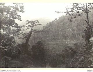 YAULA, NEW GUINEA. 1944-04-10. LOOKING DOWN THE MOUNTAIN SIDE TOWARDS D COMPANY, 57/60TH INFANTRY BATTALION WHO ARE BIVOUACED NEAR SCOTT'S CREEK