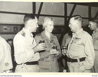 LAE, NEW GUINEA. 1944-09-26. VX104118 MAJOR R.C. UPSON (1), VFX47779 MATRON E.F. JOHNS, RRC, 2/7TH AUSTRALIAN GENERAL HOSPITAL (2), SX21592 BRIGADIER W.E.H. PASCOE, ED, COMMANDER LAE BASE SUB-AREA ..