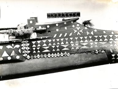 Photo of part of a carved canoe, (V5)