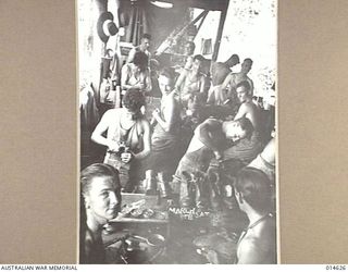 1943-04-12. NEW GUINEA. EIGHT HUNDRED PAIRS OF BOOTS ARE REPAIRED WEEKLY FOR ALLIED SOLDIERS IN NEW GUINEA AT THIS BOOT REPAIRING DEPOT. THE STAFF IS AUSTRALIAN. (NEGATIVE BY N. BROWN)