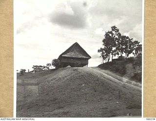 12 MILE, LALOKI RIVER, NEW GUINEA. 1943-11-15. ADMINISTRATIVE BUILDING OF THE 3RD AUSTRALIAN FARM COMPANY, AUSTRALIAN ARMY SERVICE CORPS