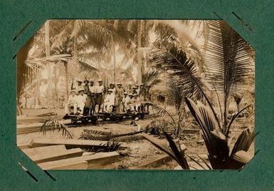 Group of men on three railcars. From the album: Banaba (Ocean Island)