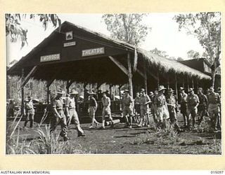 NEW GUINEA, 1943-06-25. AT A CONVALESCENT CAMP. EWOROGO THEATRE, A PICTURE THEATRE, WAS BUILT FROM TIMBER HEWN IN THE OWEN STANLEY RANGES. IT HAS SEATING ACCOMMODATION FOR 1,100. (NEGATIVE BY N. ..