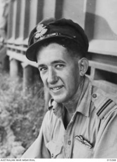 1943-07-16. NEW GUINEA. MEMBER OF AN AUSTRALIAN BOSTON BOMBER CREW FLYING OFFICER JACK MCMASTER OF HAMILTON, QUEENSLAND. (NEGATIVE BY G. SHORT)