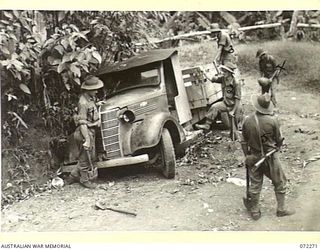 YAULA, NEW GUINEA. 1944-04-08. ONE OF MANY CHEVROLET TRUCKS CAPTURED FROM THE JAPANESE BY THE 57/60TH INFANTRY BATTALION, LOCATED ON A MOUNTAIN NEAR YAULA. THE TRUCKS WERE STRAFED FROM THE AIR AND ..