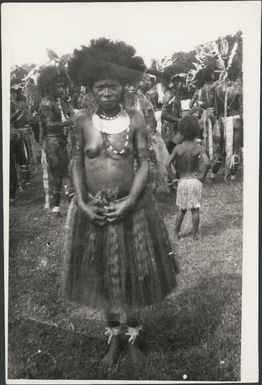 Motuan woman dancer, wearing a grass skirt, Port Moresby, Papua, ca. 1923 / Sarah Chinnery