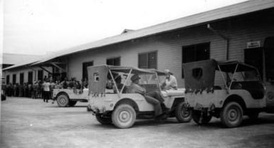 Jeeps and Building on Pacific Island