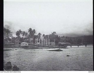 MILNE BAY, PAPUA. THE SLIPWAY AT HMAS LADAVA AS SEEN FROM THE UNITED STATES NAVY WHARF. (NAVAL HISTORICAL COLLECTION)