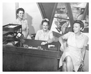 Three ANC nurses at a desk