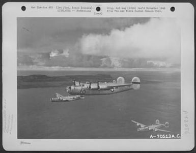 A Formation Of Consolidated B-24 "Liberators" Roars Toward Iwo Jima, Bonin Islands, Where They Will Strike Japanese Installations On The Tiny Island Halfway Between Saipan And Japanese Homeland. 21 October 1944. (U.S. Air Force Number A70513AC)