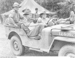 NADZAB, NEW GUINEA. 1943-09-20. OFFICERS OF THE 21ST AUSTRALIAN INFANTRY BRIGADE WHO HANDLED THE UNIT'S AIRLIFT TO KAIAPIT. THEY ARE: WX2639 CAPTAIN T. H. HODGE (1); NX127109 LIEUTENANT T. E. ..