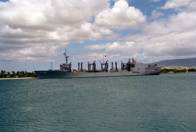 A port view of the replenishment oiler USS KANSAS CITY (AOR 3) departing Pearl Harbor.