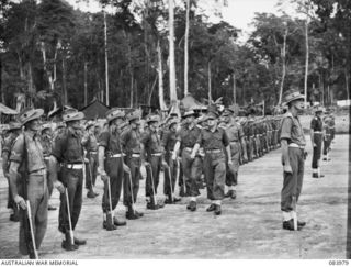 TOROKINA, BOUGAINVILLE, SOLOMON ISLANDS. 1944-12-15. MAJOR GENERAL W. BRIDGEFORD, GENERAL OFFICER COMMANDING 3 DIVISION, (9), ACCOMPANIED BY LIEUTENANT D.G. WRIGHT, AID DE CAMP, (8), AND CAPTAIN ..