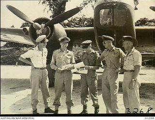 TOROKINA, BOUGAINVILLE ISLAND, SOLOMON ISLANDS. 1945-08-17. SOME OF THE BEAUFORT CREWS OF NO. 10 LOCAL AIR SUPPLY UNIT RAAF WHO DROPPED LEAFLETS TELLING OF JAPAN'S SURRENDER TO ENEMY TROOPS ON ..