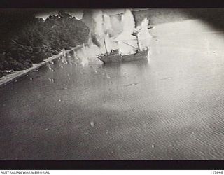 MANOKWARI, NEW GUINEA. 1944-04. JAPANESE SHIP UNDER ATTACK BY RAAF BOSTON BOMBER AIRCRAFT