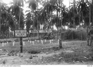 BUNA, NEW GUINEA, 1945-07-03 TO 1945-07-04. THE JAPANESE WAR CEMETERY WHICH HAS BEEN DECLARED OFF LIMITS TO HALT THE DESECRATION OF GRAVES