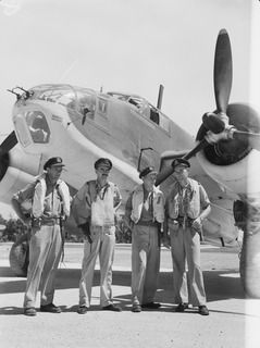 TADJI NEAR AITAPE, NORTH EAST NEW GUINEA. C. 1944-10. INFORMAL PORTRAIT OF FOUR MEMBERS OF NO. 8 (BEAUFORT) SQUADRON RAAF IN FRONT OF THEIR BEAUFORT BOMBER AIRCRAFT