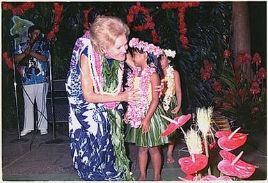 Mrs. Nixon with Hawaiian children, in Hilo, Hawaii