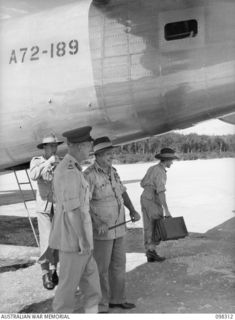 WEWAK, NEW GUINEA. 1945-10-26. GENERAL SIR THOMAS A. BLAMEY, COMMANDER-IN-CHIEF, ALLIED LAND FORCES, SOUTH WEST PACIFIC AREA, TALKING TO MAJOR GENERAL H.C.H. ROBERTSON, GENERAL OFFICER COMMANDING 6 ..