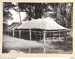TOKO, BOUGAINVILLE. 1945-06-30. THE ROMAN CATHOLIC CHAPEL AT HEADQUARTERS 3 DIVISION. IT WAS PHOTOGRAPHED AT THE REQUEST OF CHAPLAIN F.H. GALLAGHER, ROMAN CATHOLIC CHAPLAIN, HEADQUARTERS 3 DIVISION