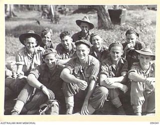 TOROKINA, BOUGAINVILLE. 1945-07-26. THE FIRST CONTINGENT OF "FIVE YEAR RELEASE PERSONNEL" TO LEAVE FOR THE RETURN TO AUSTRALIA. THESE MEN HAVE COMPLETED FIVE YEARS IN THE ARMY AND ARE BEING ..