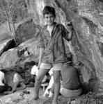 Group working on excavation, portrait of European boy