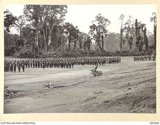 TOROKINA, BOUGAINVILLE, SOLOMON ISLANDS. 1944-12-15. 47 INFANTRY BATTALION TROOPS AT A PARADE ATTENDED BY MAJOR GENERAL W. BRIDGEFORD, GENERAL OFFICER COMMANDING 3 DIVISION (JOINS NO. 83967)