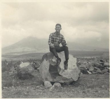 Maurice Biscocho at Cagsawa ruins with Mt. Mayon volcano in background, Philippines, 1967 / Albert Speer