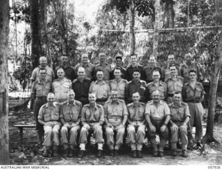 DOBODURA, NEW GUINEA. 1943-10-11. GROUP PORTRAIT OF OFFICERS OF THE "A", "Q" BRANCHES AND SERVICES, HEADQUARTERS, 11TH AUSTRALIAN DIVISION. LEFT TO RIGHT: BACK ROW: SX9042 CHAPLAIN J. F. HONNER; ..