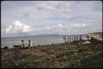 People taking goods to a boat