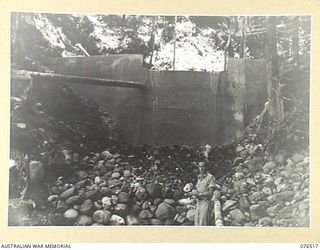 LAE, NEW GUINEA. 1944-10-18. A 90,000 GALLON RESERVOIR BUILT BY MEMBERS OF THE 20TH FIELD COMPANY TO SUPPLY WATER TO THE 2/7TH AUSTRALIAN GENERAL HOSPITAL